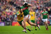 3 August 2019; Aidan O’Shea of Mayo in action against Niall O'Donnell of Donegal during the GAA Football All-Ireland Senior Championship Quarter-Final Group 1 Phase 3 match between Mayo and Donegal at Elvery’s MacHale Park in Castlebar, Mayo. Photo by Brendan Moran/Sportsfile