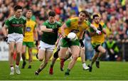 3 August 2019; Hugh McFadden of Donegal is tackled by Eoin O'Donoghue of Mayo during the GAA Football All-Ireland Senior Championship Quarter-Final Group 1 Phase 3 match between Mayo and Donegal at Elvery’s MacHale Park in Castlebar, Mayo. Photo by Brendan Moran/Sportsfile