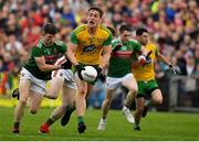 3 August 2019; Hugh McFadden of Donegal is tackled by Eoin O'Donoghue of Mayo during the GAA Football All-Ireland Senior Championship Quarter-Final Group 1 Phase 3 match between Mayo and Donegal at Elvery’s MacHale Park in Castlebar, Mayo. Photo by Brendan Moran/Sportsfile