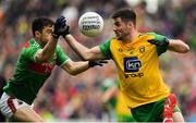 3 August 2019; Daire Ó Baoill of Donegal is dispossessed by Chris Barrett of Mayo during the GAA Football All-Ireland Senior Championship Quarter-Final Group 1 Phase 3 match between Mayo and Donegal at Elvery’s MacHale Park in Castlebar, Mayo. Photo by Brendan Moran/Sportsfile