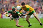 3 August 2019; Daire Ó Baoill of Donegal is tackled by Fionn McDonagh of Mayo during the GAA Football All-Ireland Senior Championship Quarter-Final Group 1 Phase 3 match between Mayo and Donegal at Elvery’s MacHale Park in Castlebar, Mayo. Photo by Brendan Moran/Sportsfile