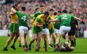 3 August 2019; Michael Murphy, left, and Patrick McBrearty of Donegal get involved with Eoin O'Donoghue and Chris Barrett of Mayo as Aidan O’Shea of Mayo lies injured during the GAA Football All-Ireland Senior Championship Quarter-Final Group 1 Phase 3 match between Mayo and Donegal at Elvery’s MacHale Park in Castlebar, Mayo. Photo by Brendan Moran/Sportsfile