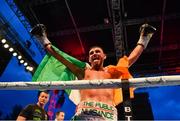 3 August 2019; Sean McComb celebrates his victory against Renald Garrido during their super-lightweight bout at Falls Park in Belfast. Photo by Ramsey Cardy/Sportsfile