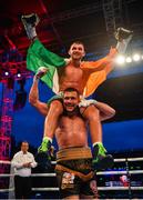 3 August 2019; Sean McComb, above, and Renald Garrido following their super-lightweight bout at Falls Park in Belfast. Photo by Ramsey Cardy/Sportsfile