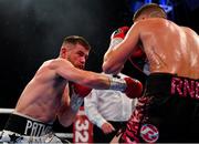 3 August 2019; Paddy Gallagher, left, in action against Chris Jenkins during their welterweight bout at Falls Park in Belfast. Photo by Ramsey Cardy/Sportsfile