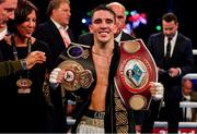 3 August 2019; Michael Conlan with the WBA and WBO Inter-Continental Featherweight title belts after defeating Diego Alberto Ruiz at Falls Park in Belfast. Photo by Ramsey Cardy/Sportsfile