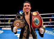 3 August 2019; Michael Conlan with the WBA and WBO Inter-Continental Featherweight title belts after defeating Diego Alberto Ruiz at Falls Park in Belfast. Photo by Ramsey Cardy/Sportsfile