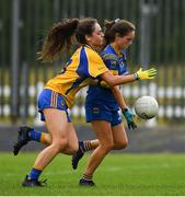 3 August 2019; Clodagh Lohan of Longford in action against Saoirse Wynne of Roscommon during the All-Ireland Ladies Football Minor B Final match between Longford and Roscommon at Duggan Park in Ballinasloe, Galway. Photo by Ray McManus/Sportsfile
