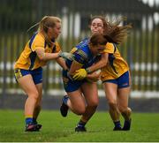 3 August 2019; Molly Mullvihill of Longford  in action against Megan Kelly, left, and Saoirse Wynne of Roscommon during the All-Ireland Ladies Football Minor B Final match between Longford and Roscommon at Duggan Park in Ballinasloe, Galway. Photo by Ray McManus/Sportsfile