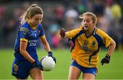 3 August 2019; Orla Nevin of Longford in action against Megan McKeon  of Roscommon during the All-Ireland Ladies Football Minor B Final match between Longford and Roscommon at Duggan Park in Ballinasloe, Galway. Photo by Ray McManus/Sportsfile