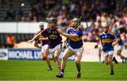 4 August 2019; Paddy Caddell of Tipperary in action against Charlie McGuckin of Wexford during the Bord Gáis GAA Hurling All-Ireland U20 Championship Semi-Final match between Tipperary and Wexford at Nowlan Park in Kilkenny. Photo by David Fitzgerald/Sportsfile