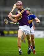 4 August 2019; Ross Banville of Wexford in action against Paddy Caddell of Tipperary during the Bord Gáis GAA Hurling All-Ireland U20 Championship Semi-Final match between Tipperary and Wexford at Nowlan Park in Kilkenny. Photo by David Fitzgerald/Sportsfile