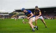 4 August 2019; Billy Seymour of Tipperary in action against Eoin Molloy of Wexford during the Bord Gáis GAA Hurling All-Ireland U20 Championship Semi-Final match between Tipperary and Wexford at Nowlan Park in Kilkenny. Photo by David Fitzgerald/Sportsfile