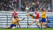 4 August 2019; Kevin O'Driscoll of Cork in action against Conor Hussey, left, and Ronan Daly of Roscommon during the GAA Football All-Ireland Senior Championship Quarter-Final Group 2 Phase 3 match between Cork and Roscommon at Páirc Uí Rinn in Cork. Photo by Matt Browne/Sportsfile