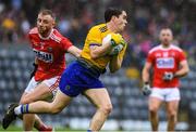 4 August 2019; David Murray of Roscommon in action against Killian O'Hanlon of Cork during the GAA Football All-Ireland Senior Championship Quarter-Final Group 2 Phase 3 match between Cork and Roscommon at Páirc Uí Rinn in Cork. Photo by Matt Browne/Sportsfile