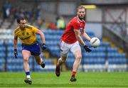 4 August 2019; Ruairi Deane of Cork in action against Niall Kilroy of Roscommon during the GAA Football All-Ireland Senior Championship Quarter-Final Group 2 Phase 3 match between Cork and Roscommon at Páirc Uí Rinn in Cork. Photo by Matt Browne/Sportsfile