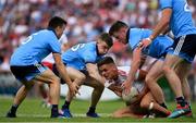 4 August 2019; Michael McKernan of Tyrone is tackled by Eoin Murchan, left, Cian O'Connor, centre and Robert McDaid of Dublin during the GAA Football All-Ireland Senior Championship Quarter-Final Group 2 Phase 3 match between Tyrone and Dublin at Healy Park in Omagh, Tyrone. Photo by Brendan Moran/Sportsfile