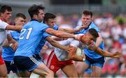 4 August 2019; Michael McKernan of Tyrone is tackled by Eoin Murchan, Michael Darragh MacAuley and Robert McDaid of Dublin during the GAA Football All-Ireland Senior Championship Quarter-Final Group 2 Phase 3 match between Tyrone and Dublin at Healy Park in Omagh, Tyrone. Photo by Brendan Moran/Sportsfile