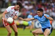 4 August 2019; Conall McCann of Tyrone in action against David Byrne of Dublin during the GAA Football All-Ireland Senior Championship Quarter-Final Group 2 Phase 3 match between Tyrone and Dublin at Healy Park in Omagh, Tyrone. Photo by Oliver McVeigh/Sportsfile