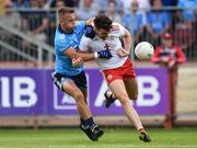 4 August 2019; Jonny Cooper of Dublin in action against Conall McCann of Tyrone during the GAA Football All-Ireland Senior Championship Quarter-Final Group 2 Phase 3 match between Tyrone and Dublin at Healy Park in Omagh, Tyrone. Photo by Oliver McVeigh/Sportsfile