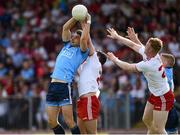 4 August 2019; Bernard Brogan of Dublin in action against Ciaran McLaughlin of Tyrone during the GAA Football All-Ireland Senior Championship Quarter-Final Group 2 Phase 3 match between Tyrone and Dublin at Healy Park in Omagh, Tyrone. Photo by Oliver McVeigh/Sportsfile