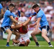 4 August 2019; Michael McKernan of Tyrone is tackled by Cian O'Connor, left, and Robert McDaid of Dublin during the GAA Football All-Ireland Senior Championship Quarter-Final Group 2 Phase 3 match between Tyrone and Dublin at Healy Park in Omagh, Tyrone. Photo by Brendan Moran/Sportsfile