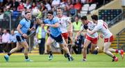 4 August 2019; Diarmuid Connolly of Dublin in action against Ben McDonnell and David Mulgrew of Tyrone during the GAA Football All-Ireland Senior Championship Quarter-Final Group 2 Phase 3 match between Tyrone and Dublin at Healy Park in Omagh, Tyrone. Photo by Oliver McVeigh/Sportsfile
