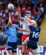 4 August 2019; Richard Donnelly of Tyrone in action against Evan Comerford and Rory O'Carroll of Dublin during the GAA Football All-Ireland Senior Championship Quarter-Final Group 2 Phase 3 match between Tyrone and Dublin at Healy Park in Omagh, Tyrone. Photo by Oliver McVeigh/Sportsfile