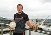 7 August 2019; PwC GAA/GPA Players of the Month for July, footballer Michael Murphy of Donegal, and hurler Patrick Horgan of Cork, were at PwC offices in Dublin today to pick up their respective awards. The players were joined by PwC’s Ronan Finn, Uachtarán Cumann Lúthchleas Gael, John Horan, and GPA Chief Executive, Paul Flynn. Pictured is Michael Murphy of Donegal with his award at PwC, Spencer Dock, North Wall Quay, Dublin. Photo by Seb Daly/Sportsfile