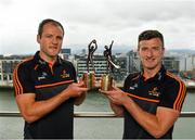 7 August 2019; PwC GAA/GPA Players of the Month for July, footballer Michael Murphy of Donegal, and hurler Patrick Horgan of Cork, were at PwC offices in Dublin today to pick up their respective awards. The players were joined by PwC’s Ronan Finn, Uachtarán Cumann Lúthchleas Gael, John Horan, and GPA Chief Executive, Paul Flynn. Pictured are Michael Murphy of Donegal, left, and Patrick Horgan of Cork with their awards at PwC, Spencer Dock, North Wall Quay, Dublin. Photo by Seb Daly/Sportsfile