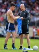 4 August 2019; Diarmuid Connolly of Dublin changes his jersey during the warm-up prior to the GAA Football All-Ireland Senior Championship Quarter-Final Group 2 Phase 3 match between Tyrone and Dublin at Healy Park in Omagh, Tyrone. Photo by Brendan Moran/Sportsfile