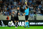 7 August 2019; Daniel Cleary of Dundalk receives a yellow card from referee Frank Schneider during the UEFA Europa League 3rd Qualifying Round 1st Leg match between SK Slovan Bratislava and Dundalk at Tehelné pole Stadium in Bratislava, Slovakia. Photo by Vid Ponikvar/Sportsfile