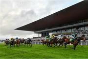 9 August 2019; Runners and riders pass the Aga Kahn Stand during the TRM Equine Nutrition Handicap at The Curragh Racecourse in Kildare. Photo by Sam Barnes/Sportsfile