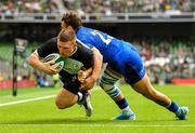 10 August 2019; Andrew Conway of Ireland dives over to score his side's third try, despite the tackle of Matteo Minozzi of Italy, during the Guinness Summer Series 2019 match between Ireland and Italy at the Aviva Stadium in Dublin. Photo by Seb Daly/Sportsfile