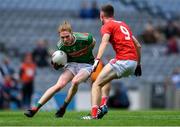 10 August 2019; Paddy Heneghan of Mayo in action against Kelan Scannell of Cork during the Electric Ireland GAA Football All-Ireland Minor Championship Semi-Final match between Cork and Mayo at Croke Park in Dublin. Photo by Piaras Ó Mídheach/Sportsfile