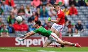 10 August 2019; Daniel Linehan of Cork shoots to score his side's second goal under pressure from Eoin Gilraine of Mayo during the Electric Ireland GAA Football All-Ireland Minor Championship Semi-Final match between Cork and Mayo at Croke Park in Dublin. Photo by Piaras Ó Mídheach/Sportsfile