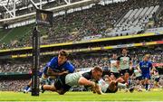 10 August 2019; Andrew Conway of Ireland dives over to score his side's third try, despite the tackle of Matteo Minozzi of Italy, during the Guinness Summer Series 2019 match between Ireland and Italy at the Aviva Stadium in Dublin. Photo by Seb Daly/Sportsfile