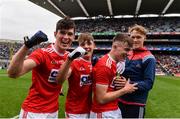 10 August 2019; Cork players, including, from left,  Shane Aherne, Darragh Cashman and Daniel Linehan, celebrate following the Electric Ireland GAA Football All-Ireland Minor Championship Semi-Final match between Cork and Mayo at Croke Park in Dublin. Photo by Sam Barnes/Sportsfile