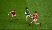 10 August 2019; Mark Tighe of Mayo in action against Alan O'Hare, left, and Keith O'Driscoll of Cork during the Electric Ireland GAA Football All-Ireland Minor Championship Semi-Final match between Cork and Mayo at Croke Park in Dublin. Photo by Daire Brennan/Sportsfile
