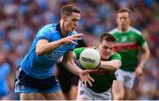 10 August 2019; Brian Fenton of Dublin in action against Matthew Ruane of Mayo during the GAA Football All-Ireland Senior Championship Semi-Final match between Dublin and Mayo at Croke Park in Dublin. Photo by Stephen McCarthy/Sportsfile