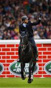 10 August 2019; Alexander Kisselbach of Germany, competing on Gannan, celebrates clearing 2 metres during the Land Rover Puissance at the Stena Line Dublin Horse Show 2019 at the RDS in Dublin. Photo by Harry Murphy/Sportsfile