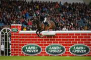 10 August 2019; Wesley Ryan of Ireland, competing on Larthago, fails to jump 2 metres during the Land Rover Puissance at the Stena Line Dublin Horse Show 2019 at the RDS in Dublin. Photo by Harry Murphy/Sportsfile