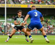 10 August 2019; Joey Carbery of Ireland in action against Marco Riccioni of Italy during the Guinness Summer Series 2019 match between Ireland and Italy at the Aviva Stadium in Dublin. Photo by Seb Daly/Sportsfile