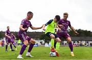 10 August 2019; Stephen O'Leary of Cobh Ramblers in action against James Carroll, left, and John Mountney of Dundalk during the Extra.ie FAI Cup First Round match between Cobh Ramblers and Dundalk at St. Colman’s Park in Cobh, Co. Cork. Photo by Eóin Noonan/Sportsfile
