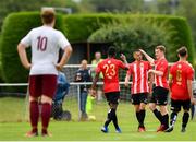 11 August 2019; Marco Chindea of Lucan United, lsecond left, is congratulated by team-mates after scoring his side's first goal during the Extra.ie FAI Cup First Round match between Lucan United and Killester Donnycarney at Celbridge Football Park in Kildare. Photo by Seb Daly/Sportsfile