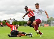 11 August 2019; Cian McMullan of Killester Donnycarney in action against Ajitola Sule, left, and Bobinel Mazono of Lucan United during the Extra.ie FAI Cup First Round match between Lucan United and Killester Donnycarney at Celbridge Football Park in Kildare. Photo by Seb Daly/Sportsfile