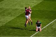 11 August 2019; Daniel OíFlaherty, left, and Cian Hernon of Galway celebrate, as a dejected Cathal Ó Beaglaoich of Kerry lies on the field after the Electric Ireland GAA Football All-Ireland Minor Championship Semi-Final match between Kerry and Galway at Croke Park in Dublin. Photo by Daire Brennan/Sportsfile