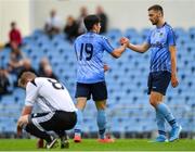 11 August 2019; Liam Kerrigan of UCD, left, is congratulated by team-mate Richie O'Farrell after scoring his side's fourth goal during the Extra.ie FAI Cup First Round match between UCD and Letterkenny Rovers at UCD Bowl in Belfield, Dublin. Photo by Seb Daly/Sportsfile