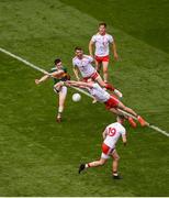 11 August 2019; Paul Murphy of Kerry has his shot blocked by Colm Cavanagh of Tyrone during the GAA Football All-Ireland Senior Championship Semi-Final match between Kerry and Tyrone at Croke Park in Dublin. Photo by Daire Brennan/Sportsfile