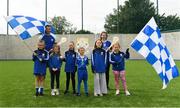 11 August 2019; Dublin duo hurler Eamonn Dillon and camogie player Siobhan Kehoe both from Naomh Fionbarra GAA Club are pictured with young Naomh Fionnbarr players at the launch of Community Credit Union’s 10-year sponsorship of the new ‘Community Park’ pitch at Naomh Fionnbarra GAA Club in Cabra, Dublin, marking the first day of Naomh Fionnbarra’s Festival Week 2019. Photo by Harry Murphy/Sportsfile